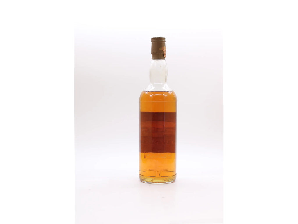 Retro della bottiglia di Bowmore 20 anni 1965 con etichetta d'importazione Intertrade Italia, Rimini